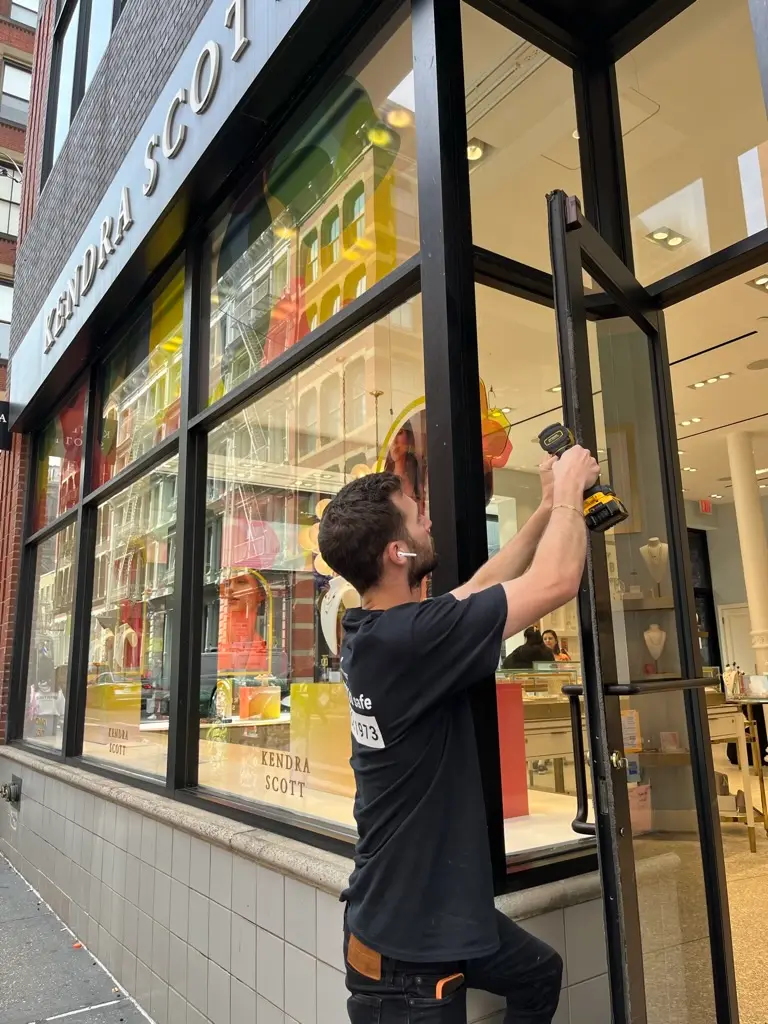 Bay Ridge locksmith installing commercial storefront glass door hardware